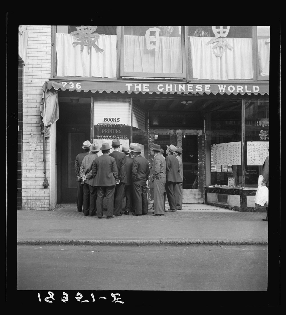 News of the surrender of Canton to the Japanese. San Francisco, California. Chinatown by Dorothea Lange