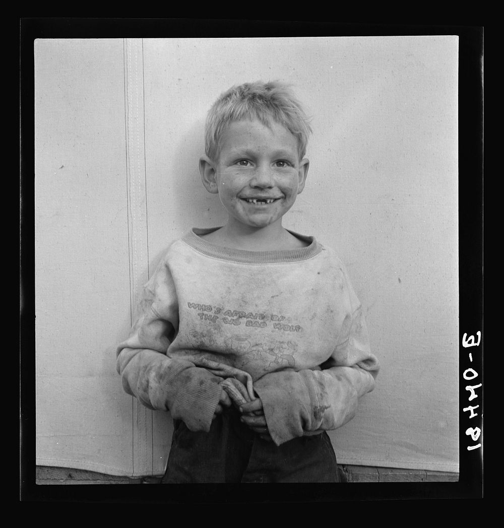 Migrant cotton picker's child who lives in a tent in the government camp instead of along the highway or in a ditch bank.…