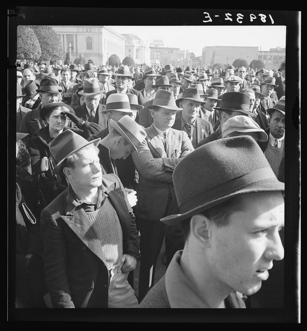 Listening to speeches at mass meeting of Works Progress Administration (WPA) workers protesting congressional cut of relief…