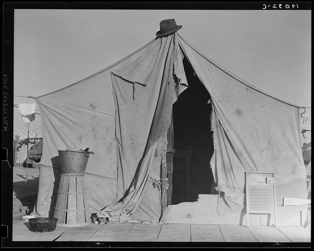 [Untitled photo, possibly related to: One of a row of tents, home of a pea picker. Near Calipatria, Imperial Valley…