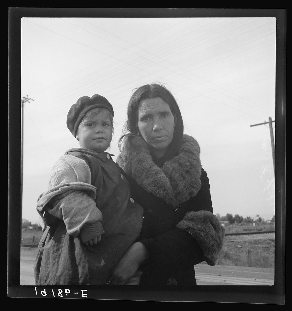 [Untitled photo, possibly related to: On U.S. 99. Near Brawley, Imperial County. Homeless mother and youngest child of seven…