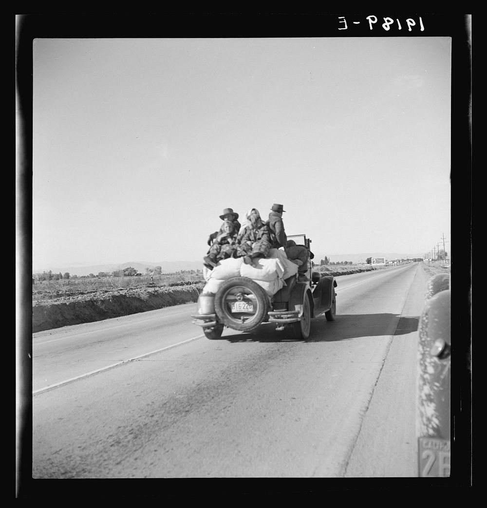 [Untitled photo, possibly related to: Eight related persons just arriving in this roadster from Texas. In search of…