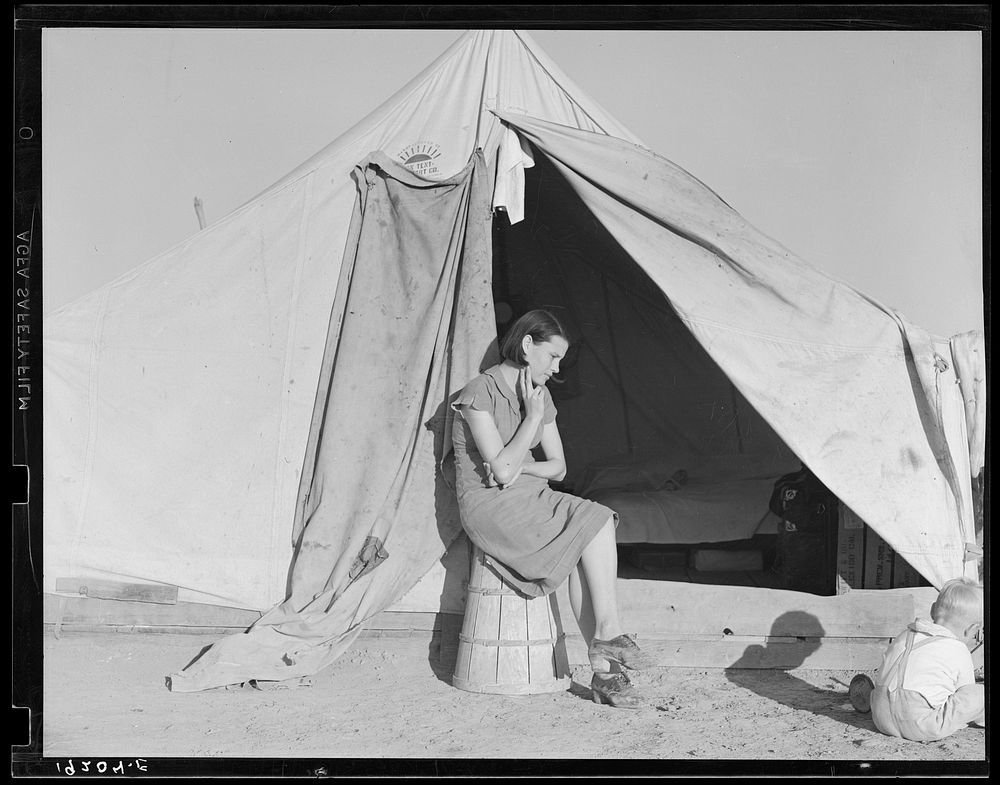 Young migrant mother who lives in one of the tents. California. Farm Security Administration (FSA) emergency camp.…