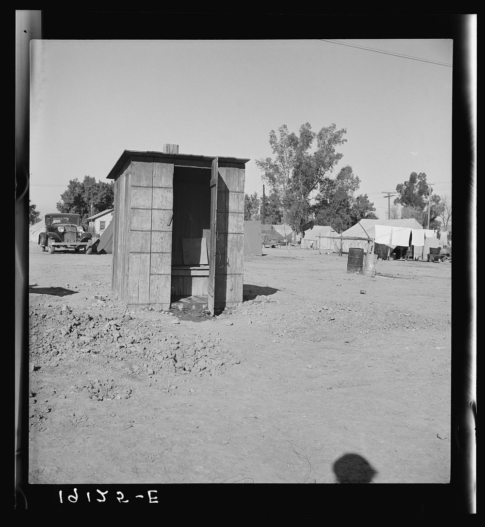Sanitary facilities in camp of carrot pullers. Near Holtville, Imperial Valley, California. Sourced from the Library of…