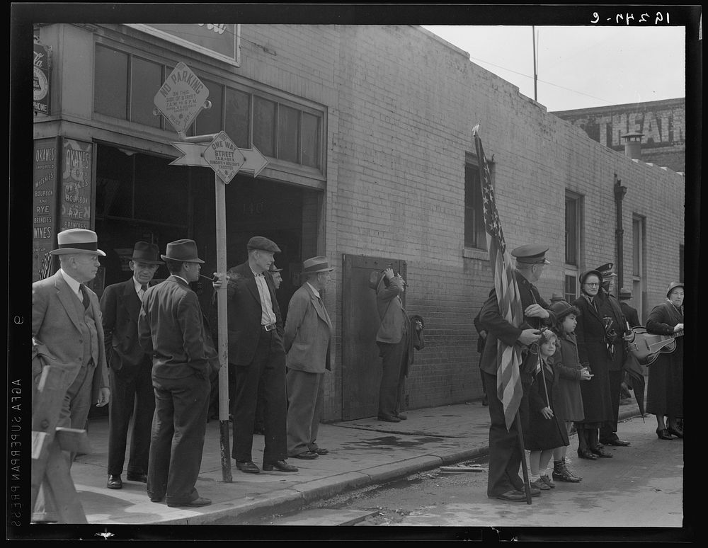 Salvation Army, San Francisco, California. Men come out of adjacent bar to watch, and return to the bar. (San Francisco is…