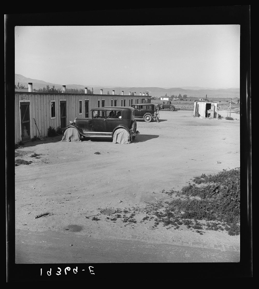 [Untitled photo, possibly related to: Arkansawyers auto camp. Ten cabins which rent for ten dollars a month with iron bed…
