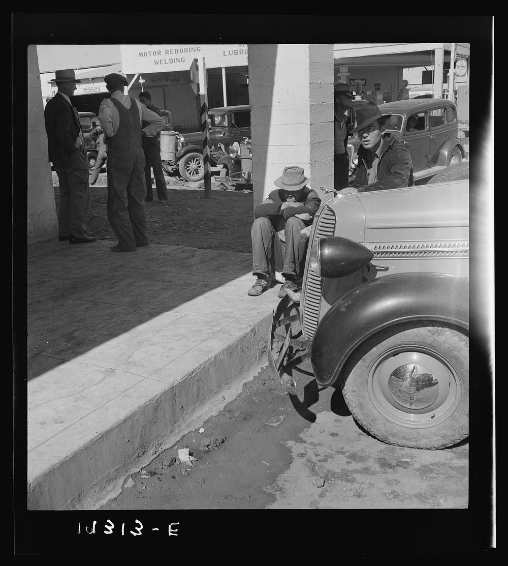 [Untitled photo, possibly related to: Outside Farm Security Administration (FSA) grant office during the pea harvest.…