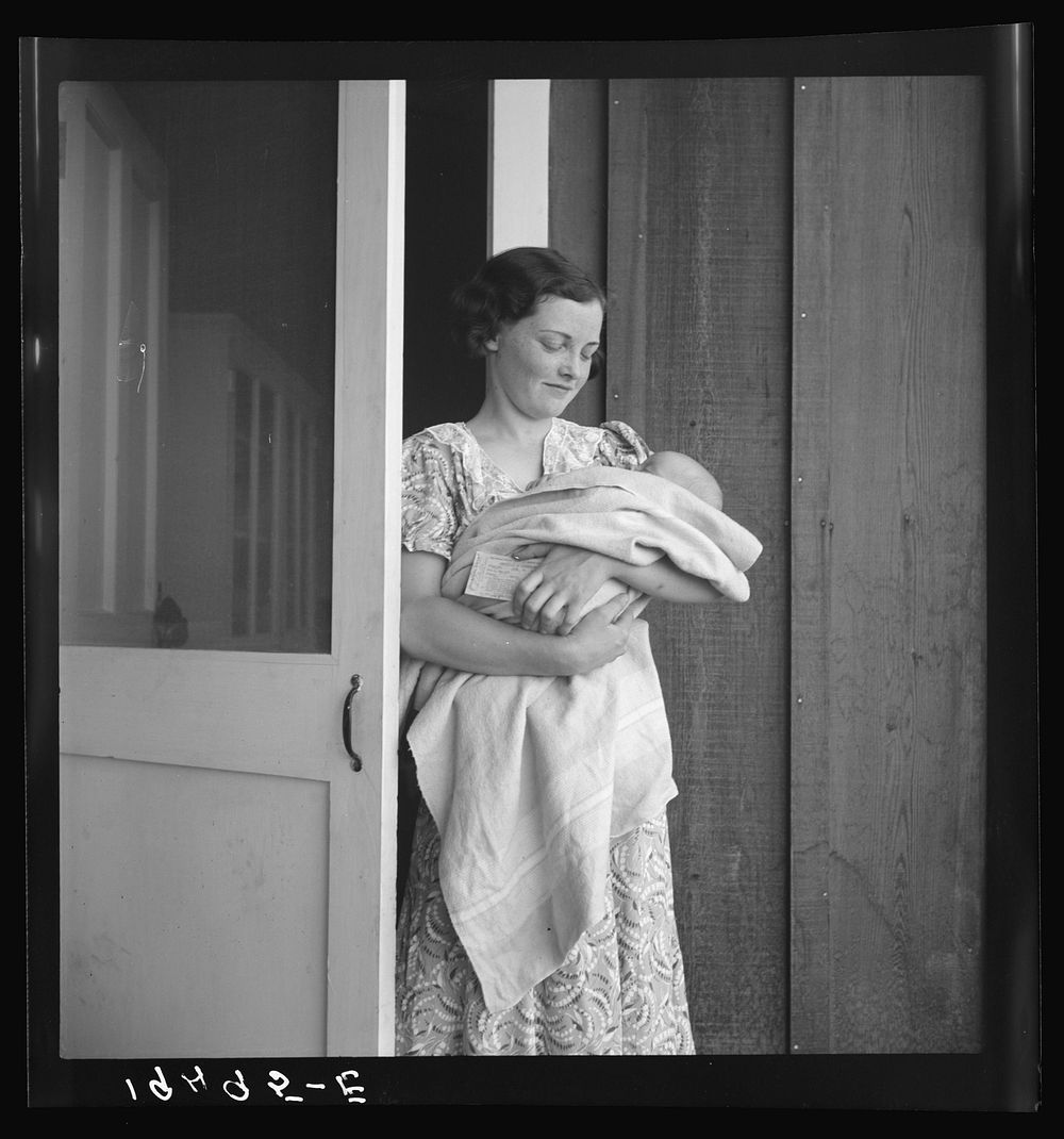 Farm Security Administration (FSA) migrant camp. Westley, California. This migrant mother lives in a contractor's camp…