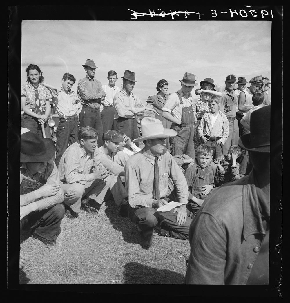 Watching ball game. Shafter camp for migrants. California. Sourced from the Library of Congress.