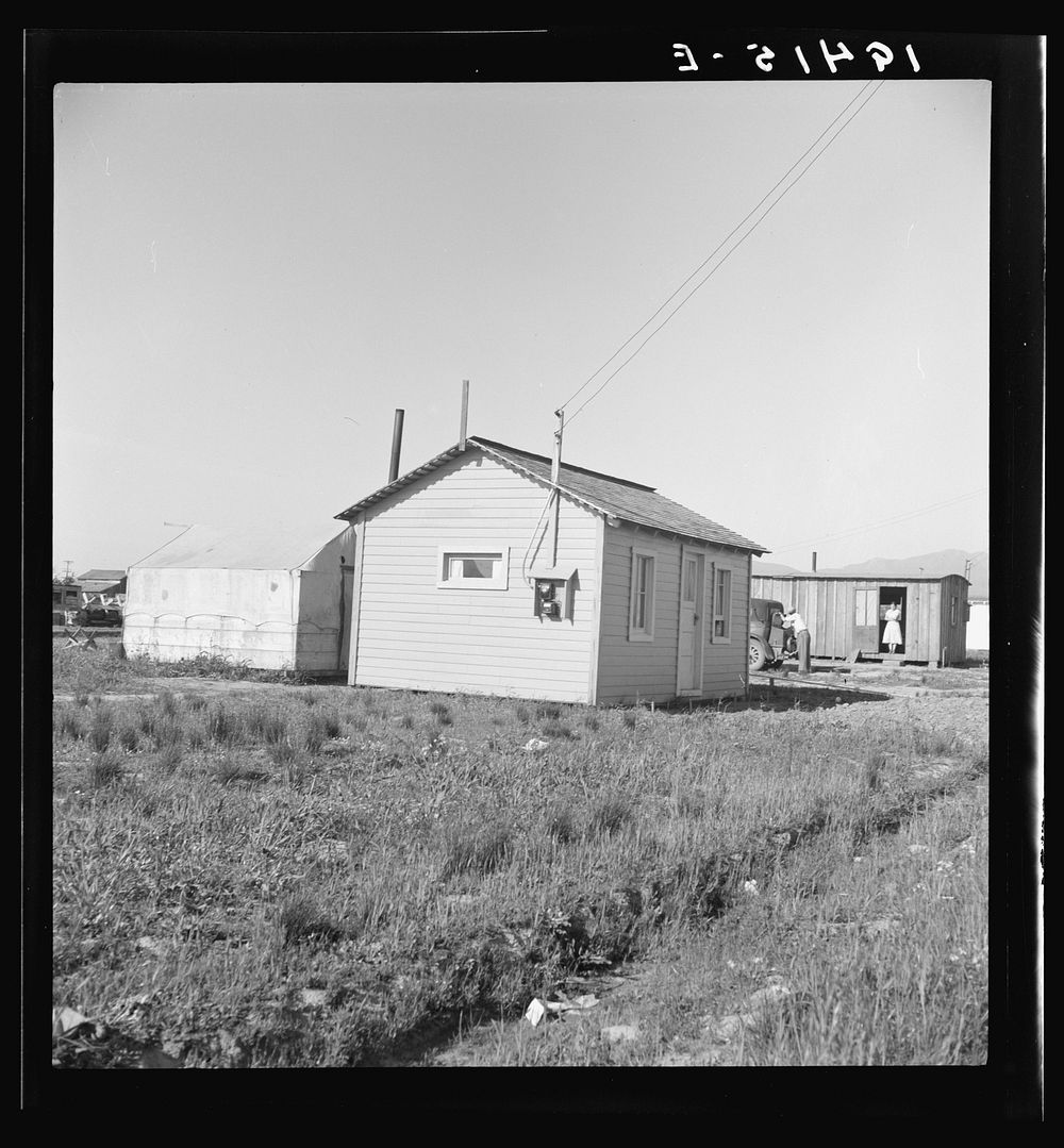 Housing for rapidly growing settlement of lettuce workers on fringes of town. Salinas, California. Sourced from the Library…