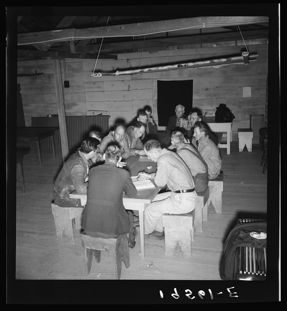 Farm Security Administration (FSA) camp for migratory agricultural workers. Farmersville, California. Meeting of the camp…