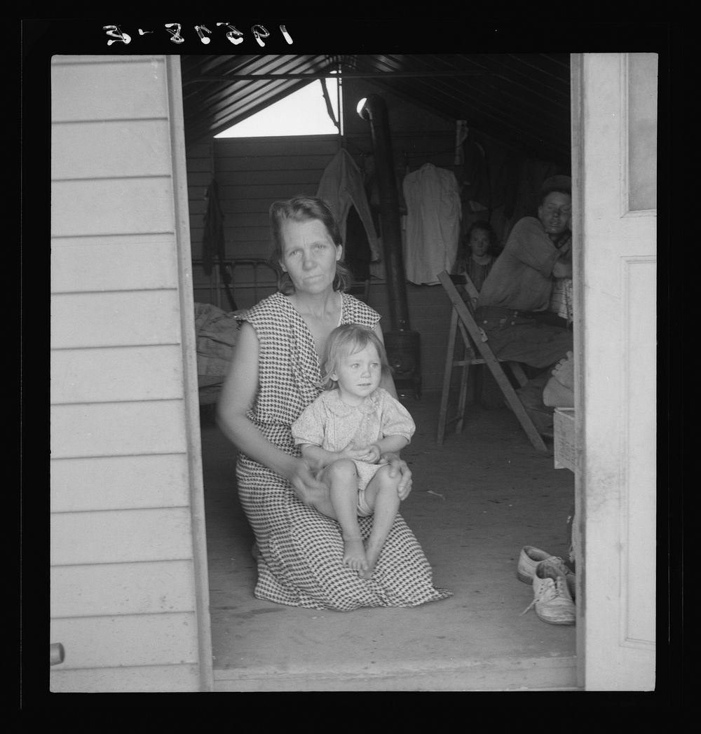 [Untitled photo, possibly related to: Tulare County, Farm Security Administration (FSA) camp. Migrant mother and child at…