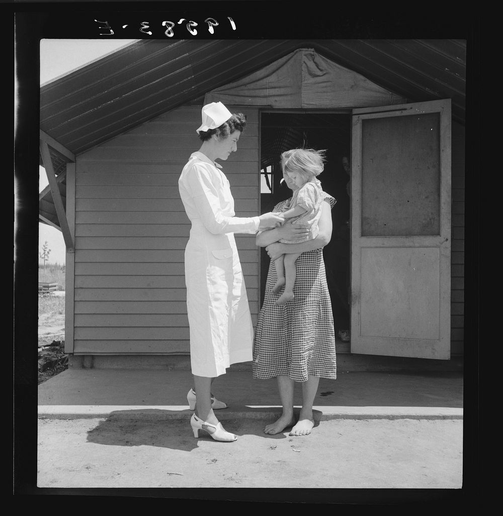 Farm Security Administration (FSA) camp. Farmersville, Tulare County, California. Shows resident nurse come to visit family…