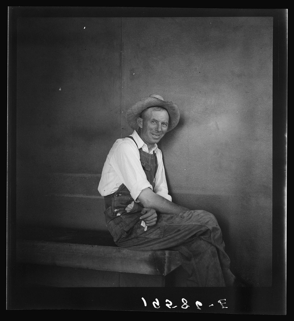 Tulare County, at Farm Security Administration (FSA) camp at Farmersville, California by Dorothea Lange