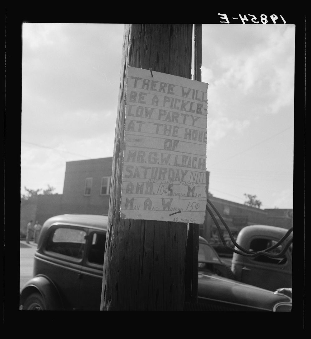 Sign tacked to pole near the post office. Main street, Pittsboro, North Carolina. Sourced from the Library of Congress.