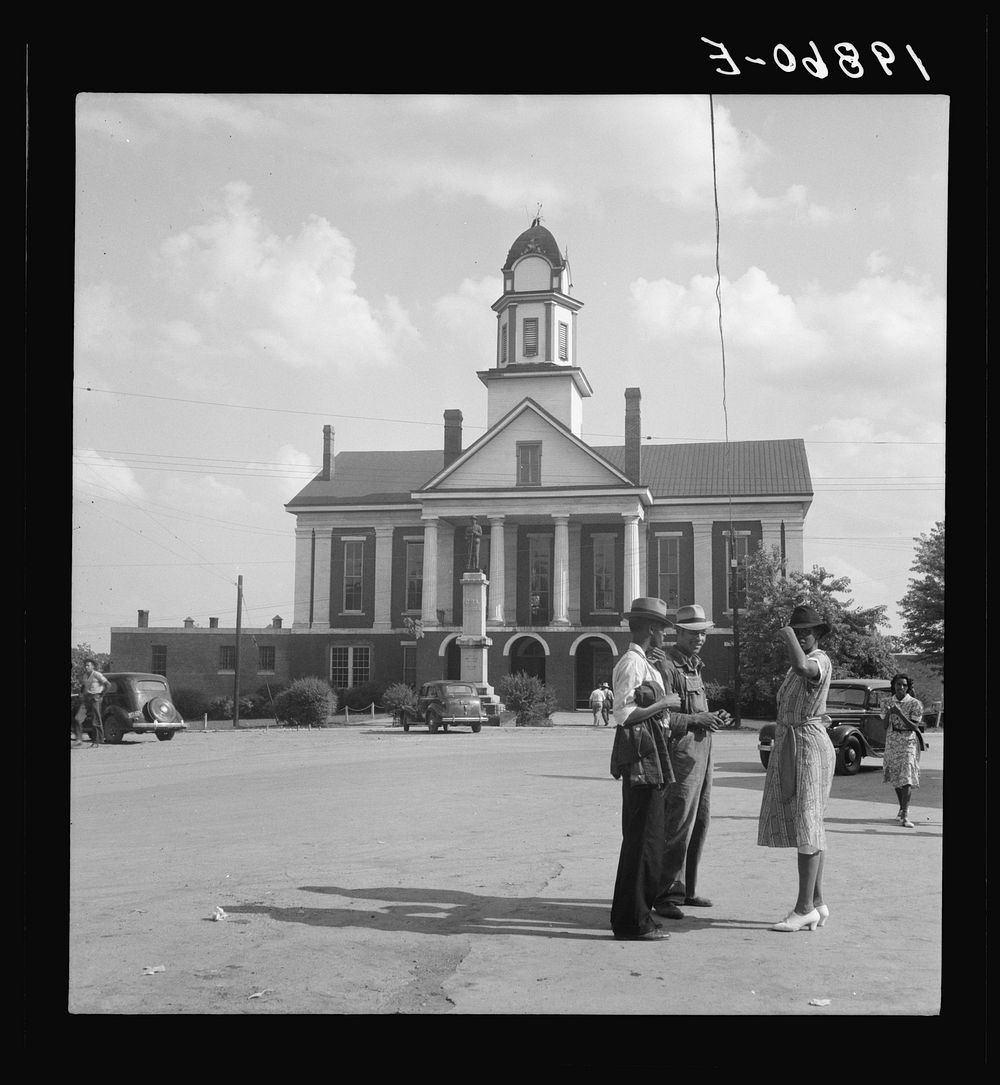 Courthouse, Pittsboro, North Carolina. Note ever present Confederate States of America monument. Sourced from the Library of…