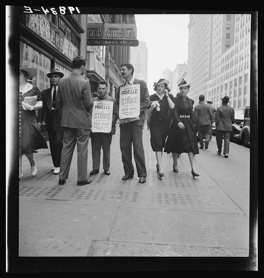 New York City. Four firms on 42nd Street in block east of Fifth Avenue were being picketed in this manner on this afternoon.…