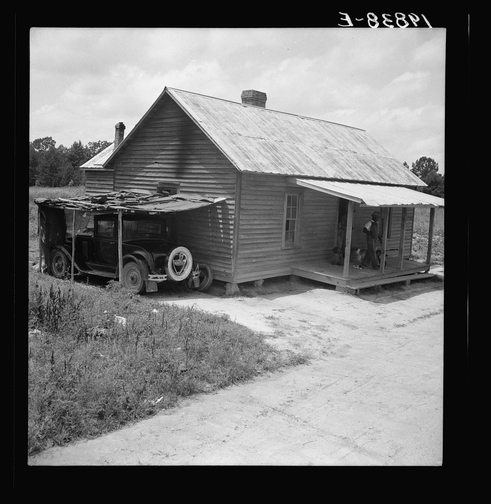 Home of  tobacco tenant with addition of improvised garage. Wake County, North Carolina. Sourced from the Library of…