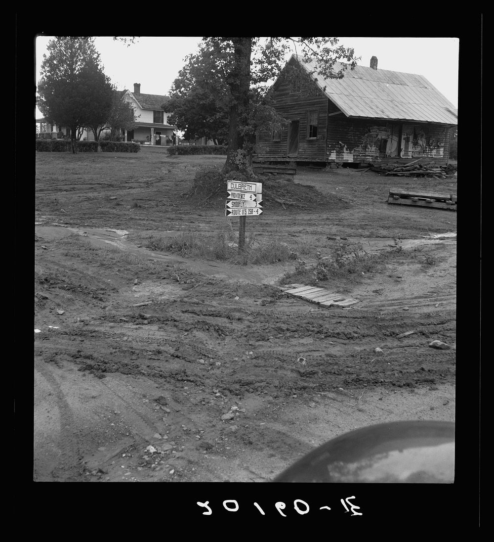 Crossroads hamlet after a rain. Culbreth, Granville County, North Carolina. Sourced from the Library of Congress.