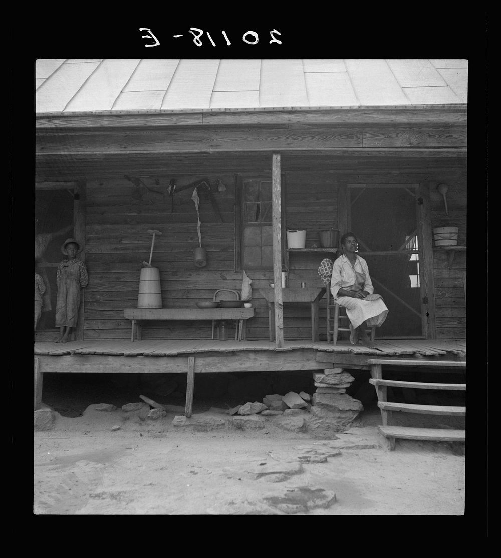 [Untitled photo, possibly related to: Porch of  tenant house, showing household equipment. Person County, North Carolina].…