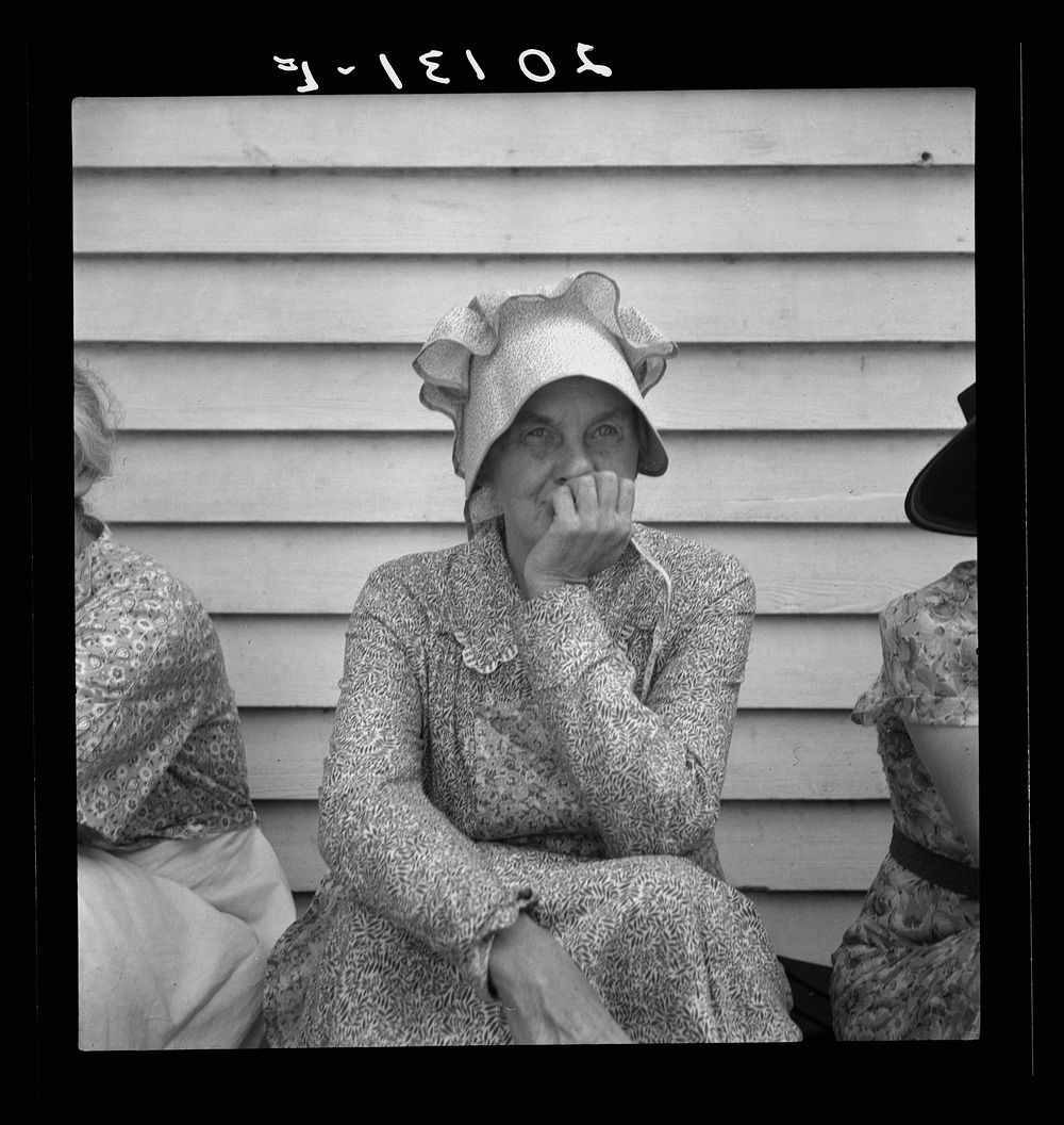 [Untitled photo, possibly related to: Member of the congregation of Wheeley's church who is called "Queen." She is wearing…