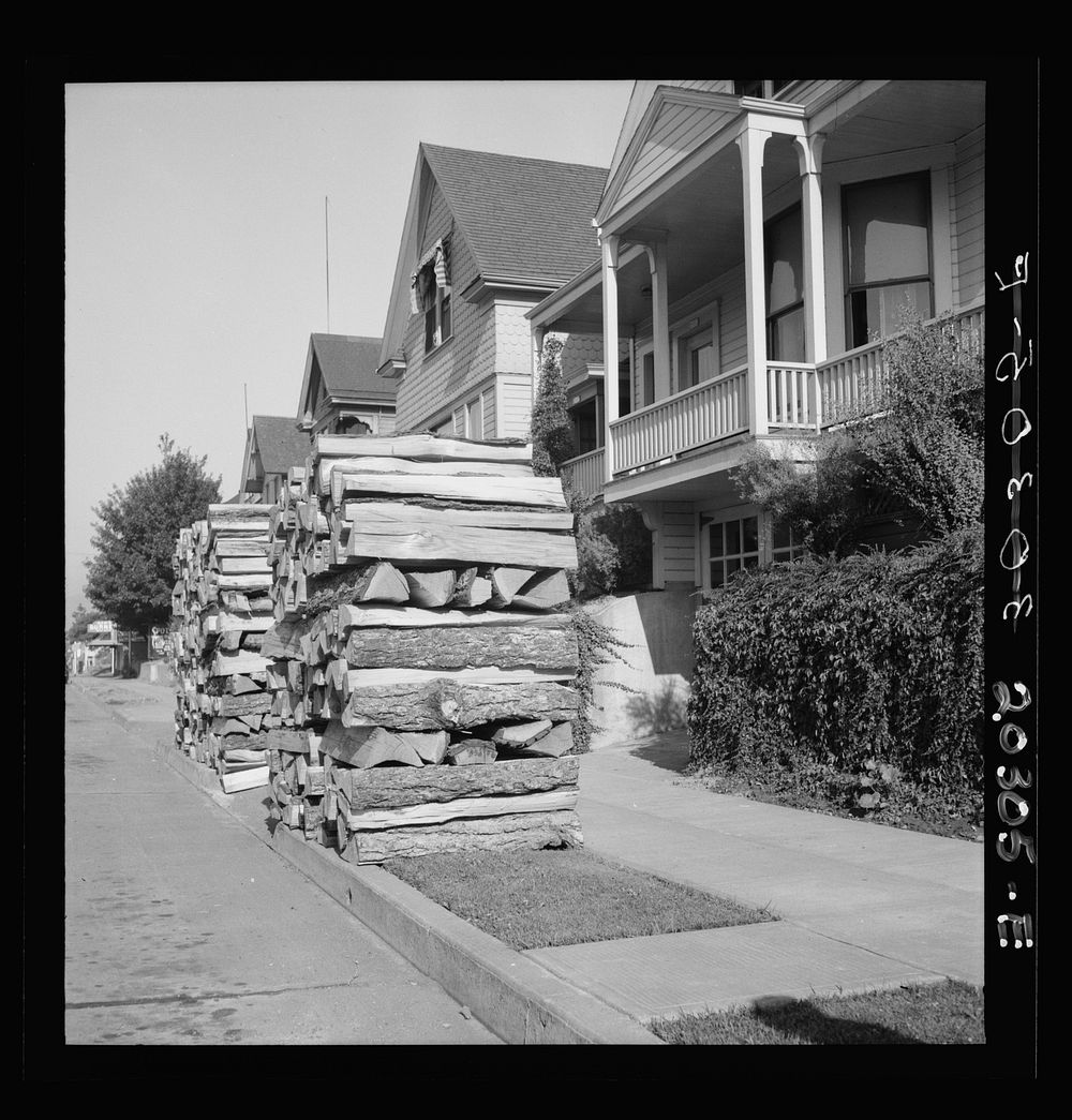 Woodpiles along the street are a characteristic of Portland, Oregon. Costs five dollars and fifty cents per cord, and must…