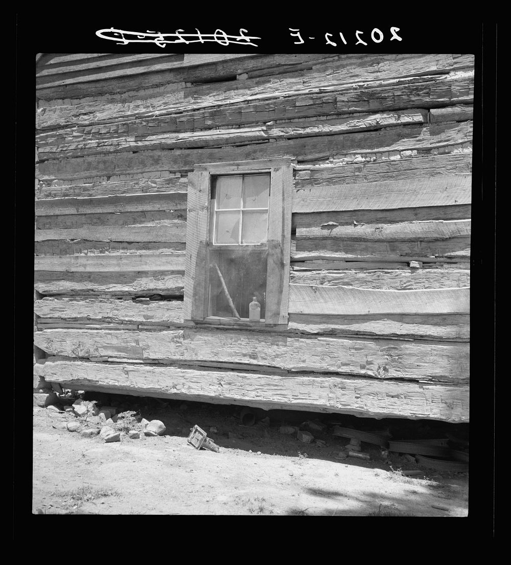 Log house of rural non-farm family. House is over fifty years old. Orange County, North Carolina. Sourced from the Library…