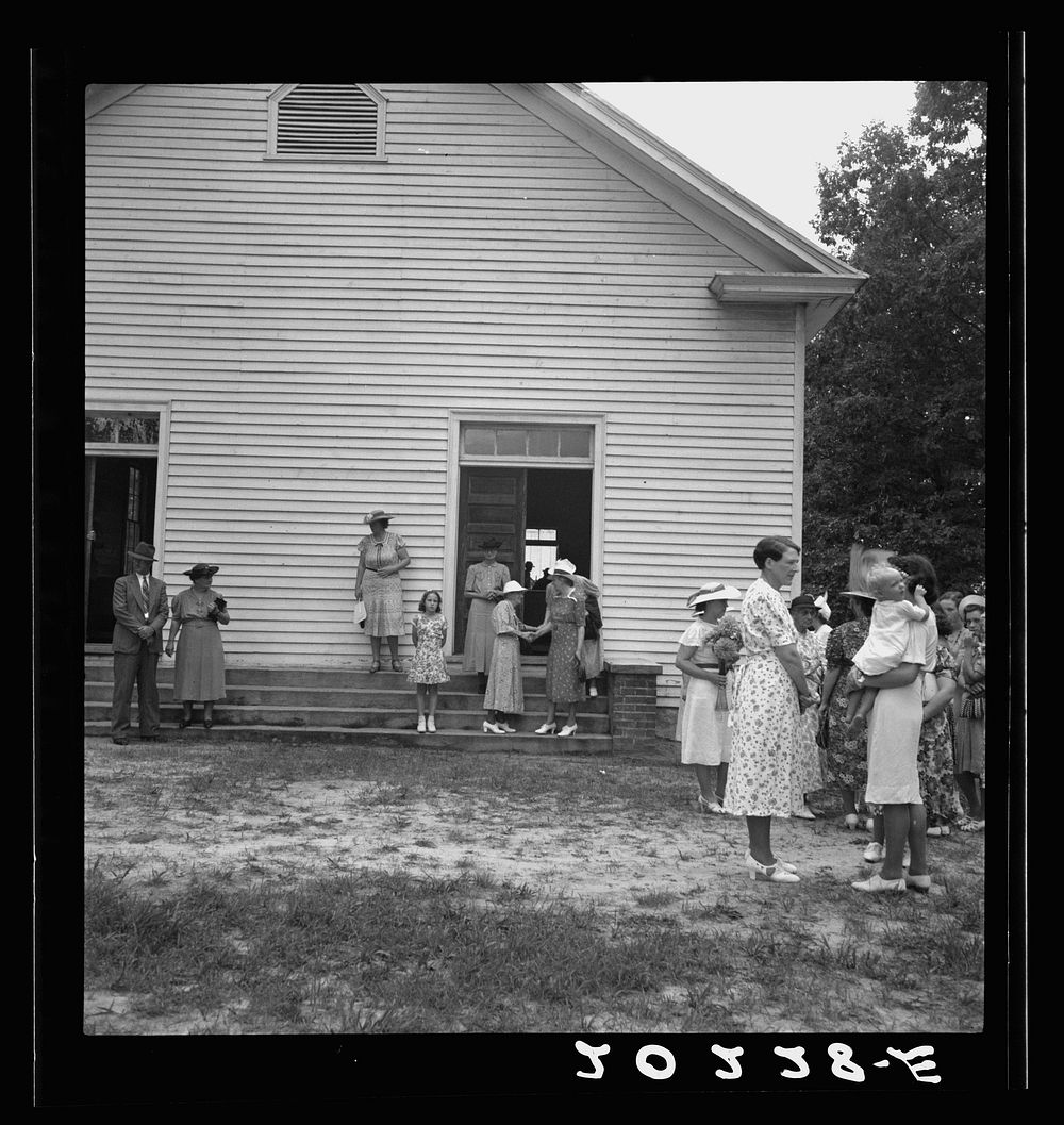 [Untitled photo, possibly related to: Congregation entering church. Wheeley's Church. Person County, North Carolina].…
