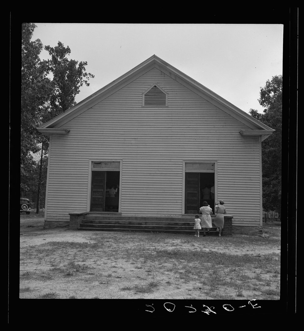 [Untitled photo, possibly related to: Congregation entering church. Wheeley's Church. Person County, North Carolina].…