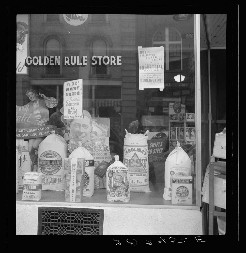 A grocery window. Sourced from the Library of Congress.