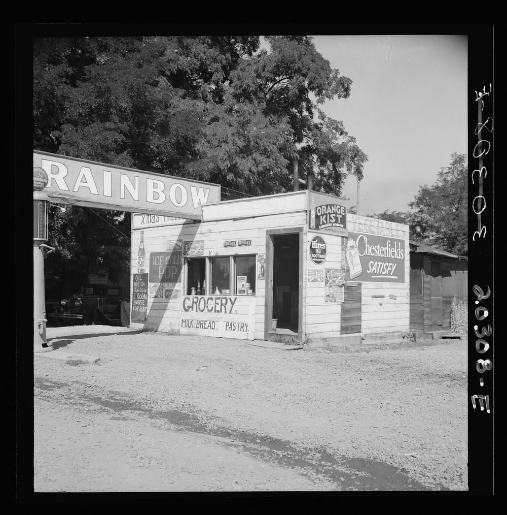 Crossroads grocery store and filling station, typical of many such small enterprises in new community. Yakima, Washington…
