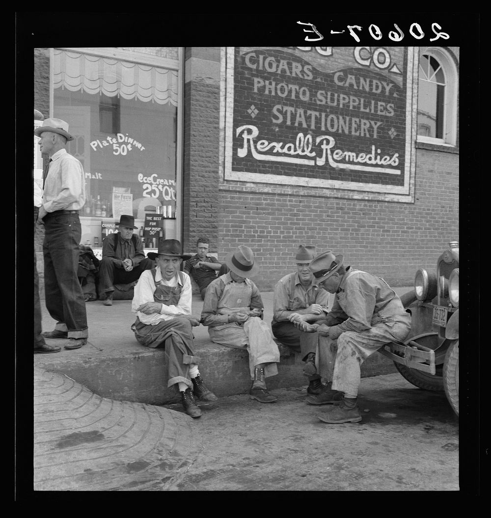 Williamette Valley hop farmers in town hold their political forum on drug store corner. Independence, Oregon. Sourced from…
