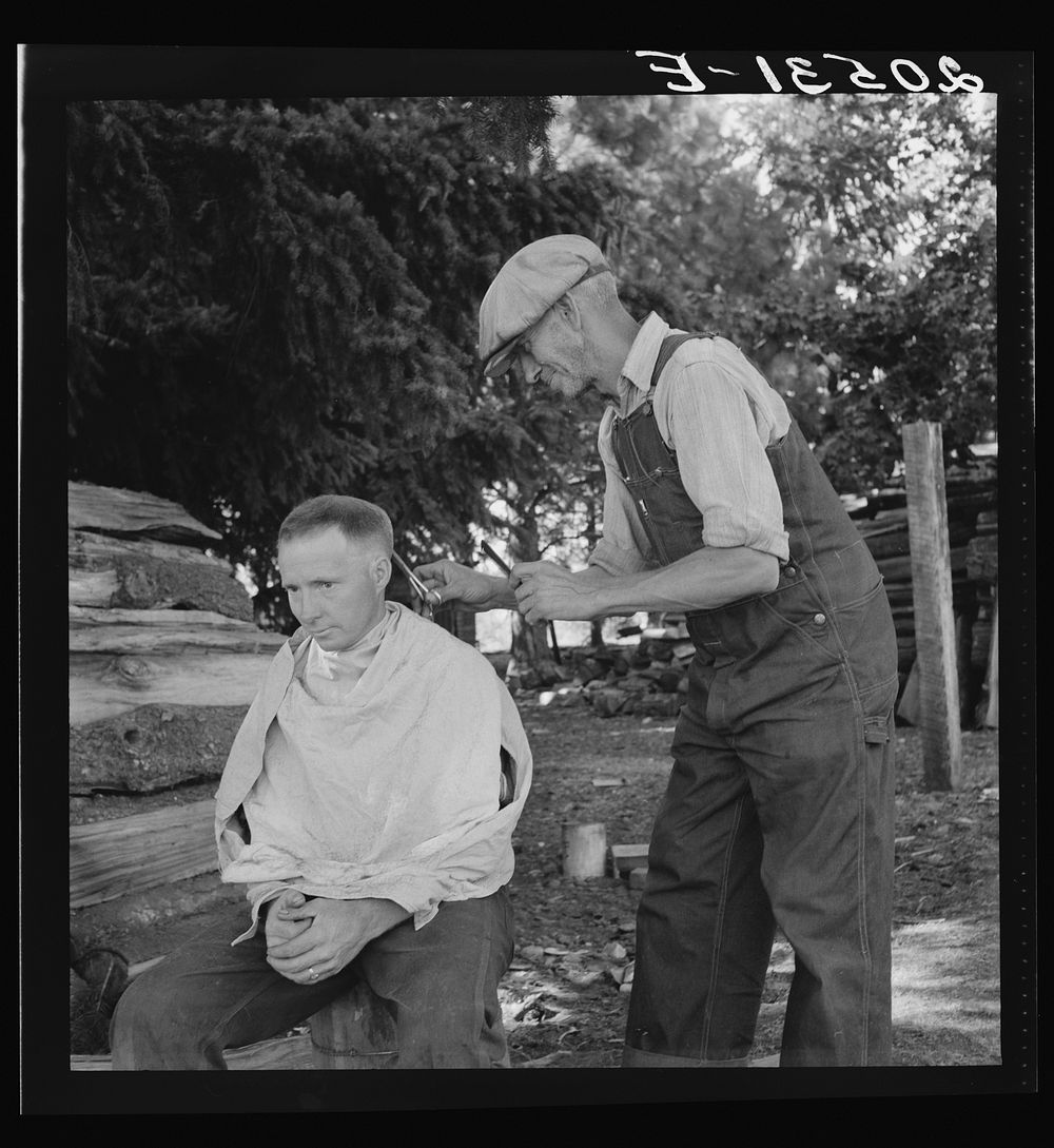 Oregon, Marion County, near West Stayton. Bean pickers barber each other.. Sourced from the Library of Congress.