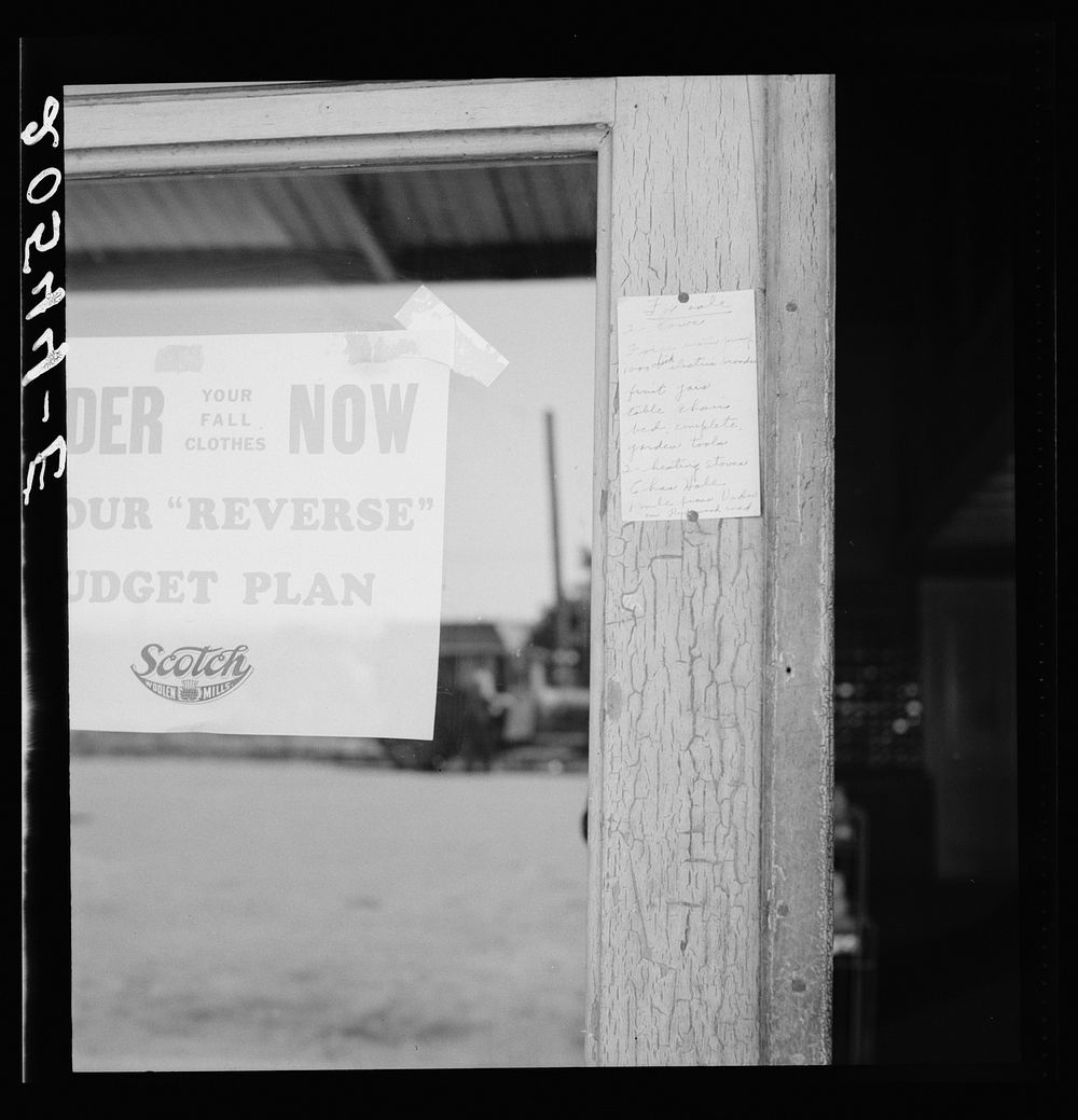Sign on post office door: Farm animals and household equipment for sale. Vader, western Washington. Sourced from the Library…
