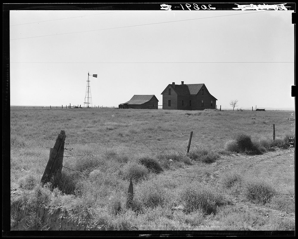 Abandoned farmhouse in the Columbia Basin. The land of this farm is still used for dry land grain farming, but is operated…