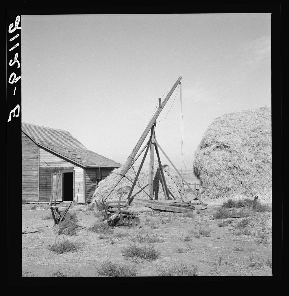 [Untitled photo, possibly related to: Type of hay derrick characteristic of Oregon landscape. Irrigon, Morrow County…