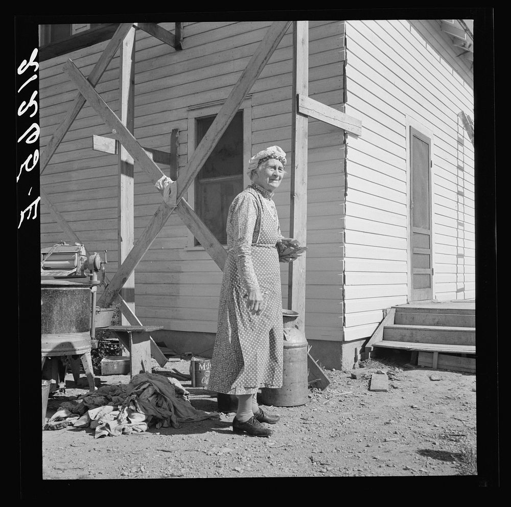 Soper grandmother helps the large family. Willow Creek area, Malheur County, Oregon. General caption number 72. Sourced from…