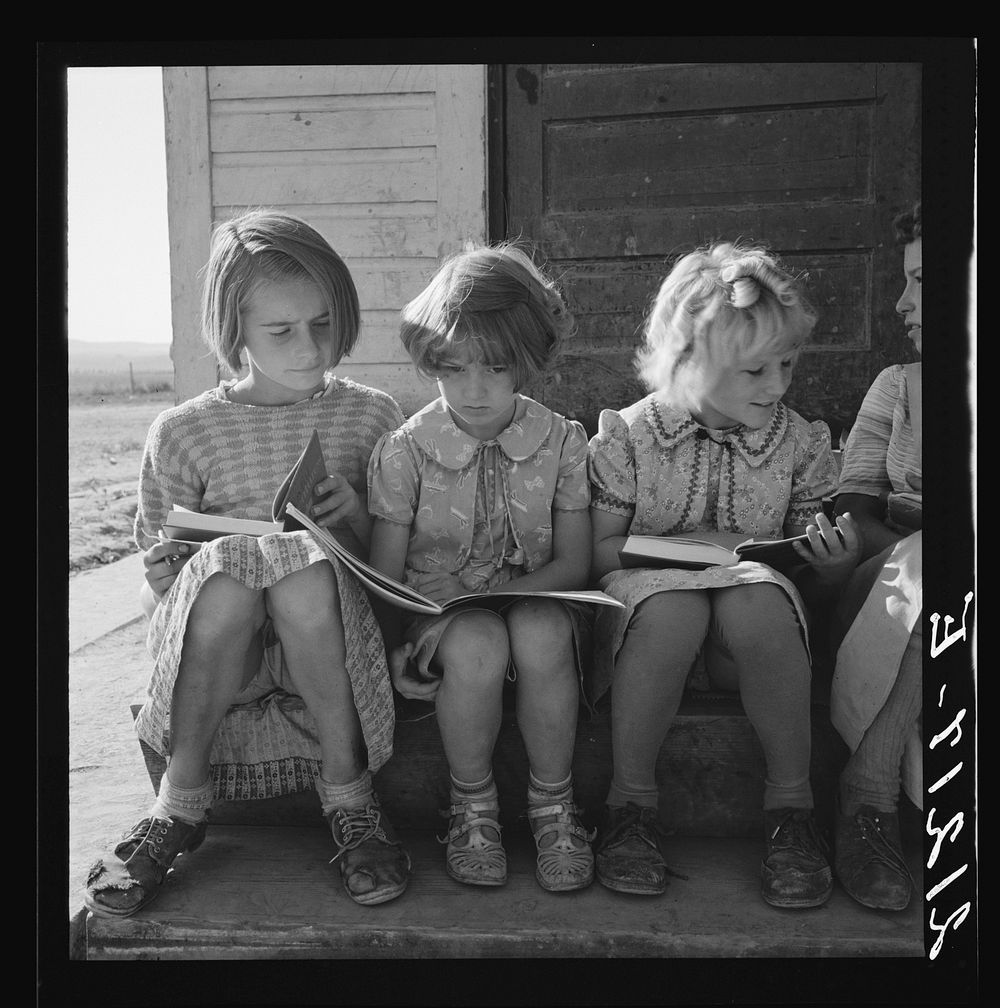 Girls of Lincoln Bench School study their reading lesson. Near Ontario, Malheur County, Oregon by Dorothea Lange. Sourced…