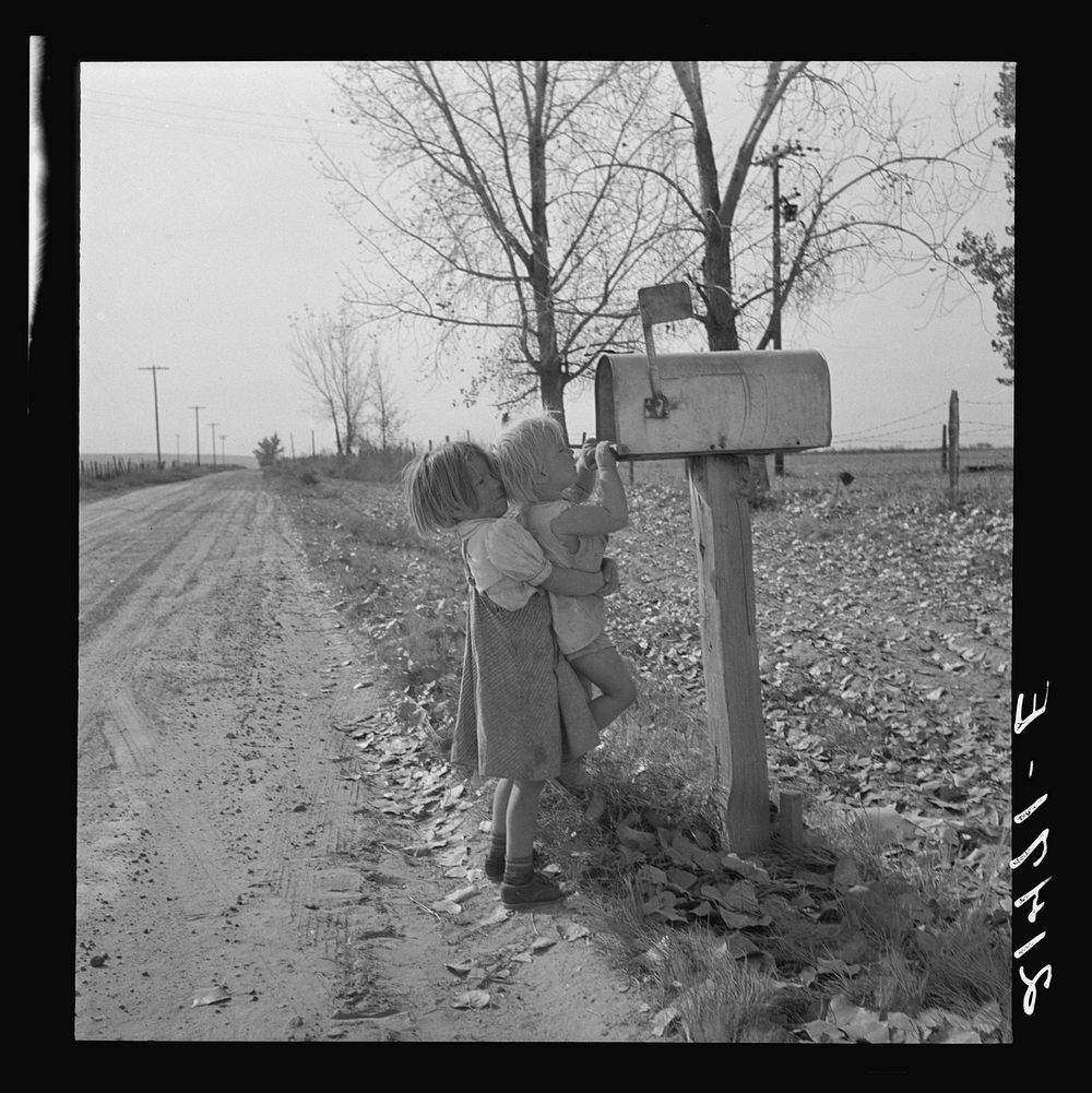 Rural children at R.F.D. box, near Fruitland, Idaho by Dorothea Lange. Sourced from the Library of Congress.