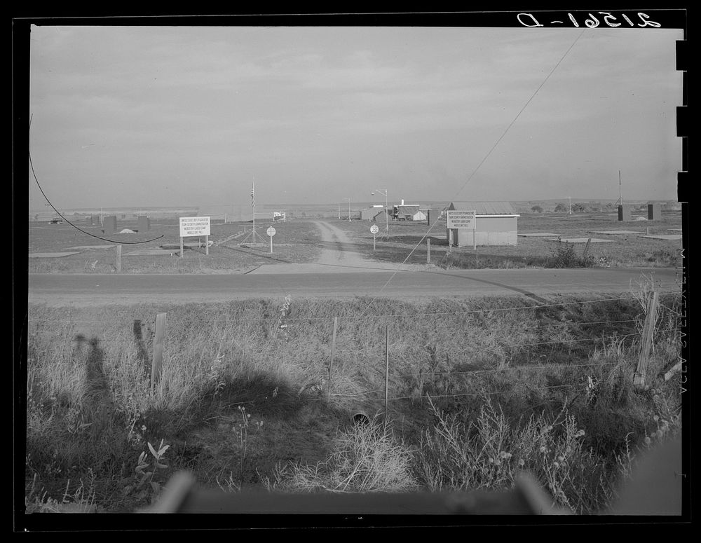[Untitled photo, possibly related to: Entrance to Nyssa Farm family labor camp, FSA (Farm Security Administration) mobile…