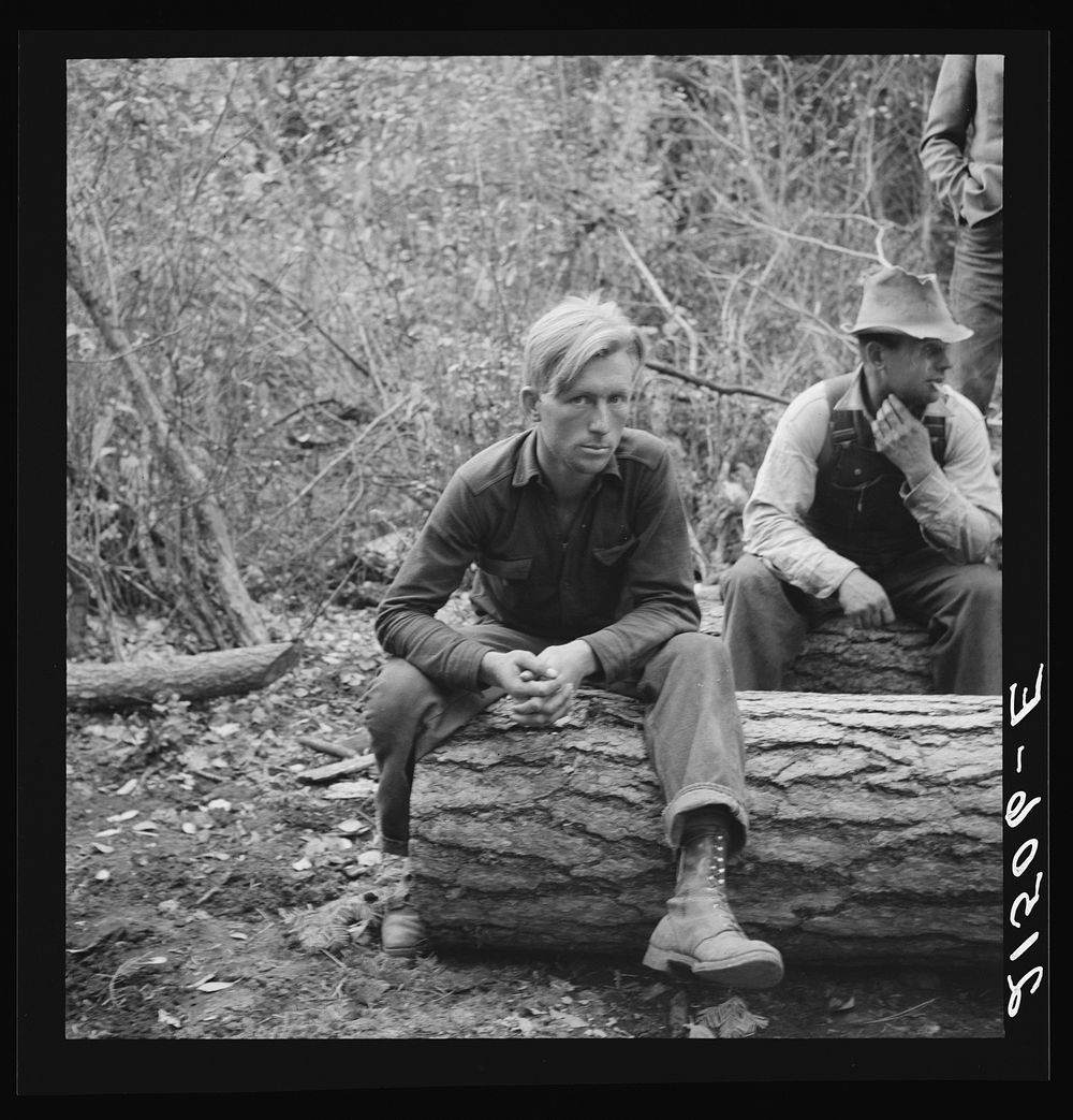 [Untitled photo, possibly related to: Member of the co-op in the woods. Ola self help cooperative sawmill. Gem County…