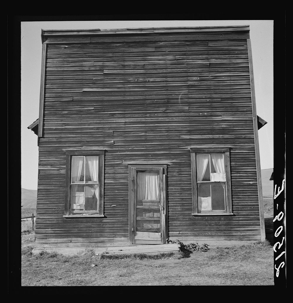 Member of Ola self help sawmill co-op lives in what was once the "Jacknife Saloon." This type building is characteristic of…