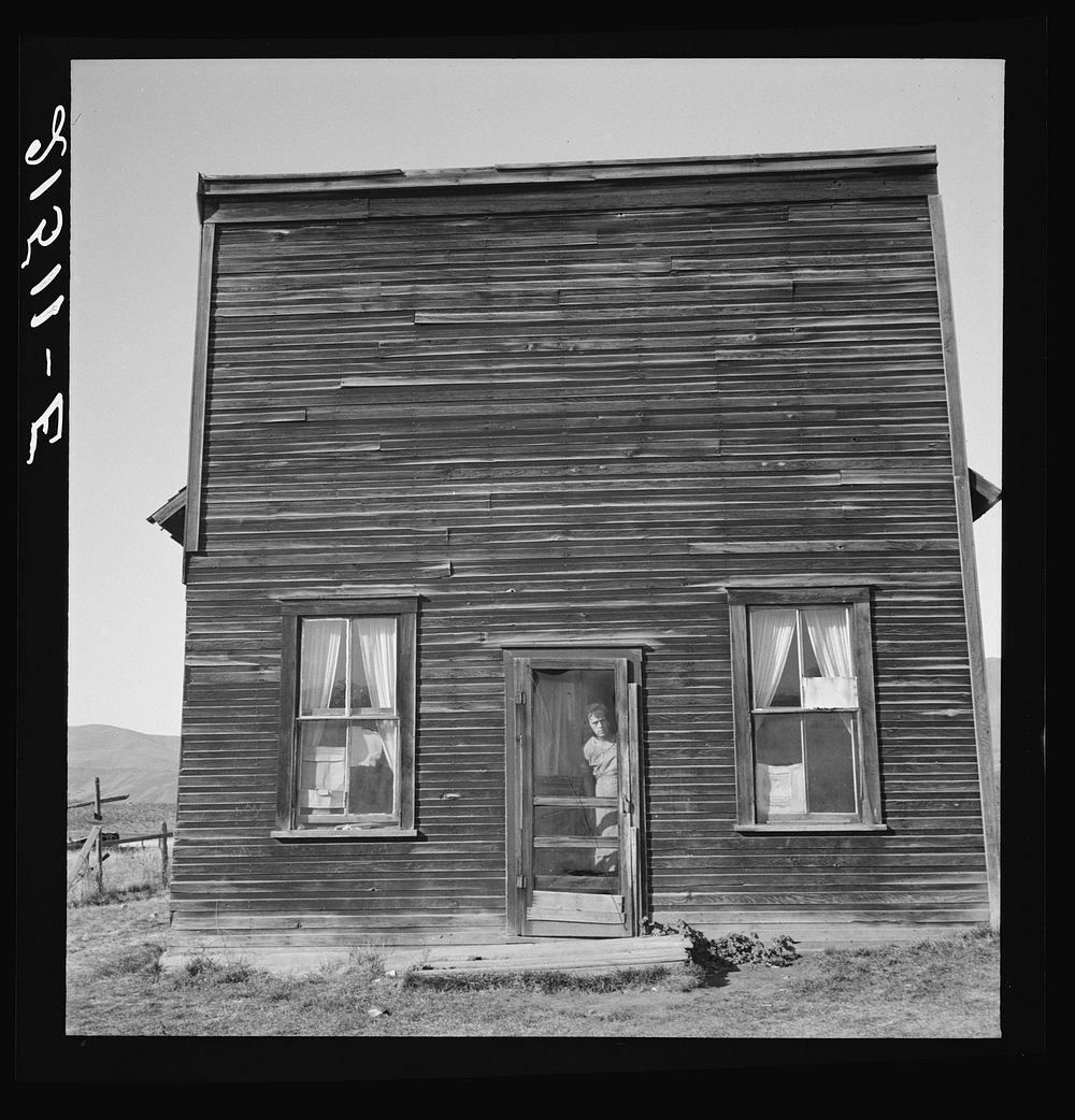 [Untitled photo, possibly related to: Member of Ola self help sawmill co-op lives in what was once the "Jacknife Saloon."…