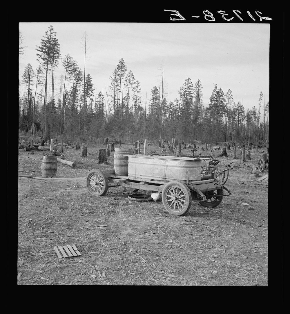 [Untitled photo, possibly related to: Improved water tank on stump ranch. Boundary County, Idaho. See general caption 53].…