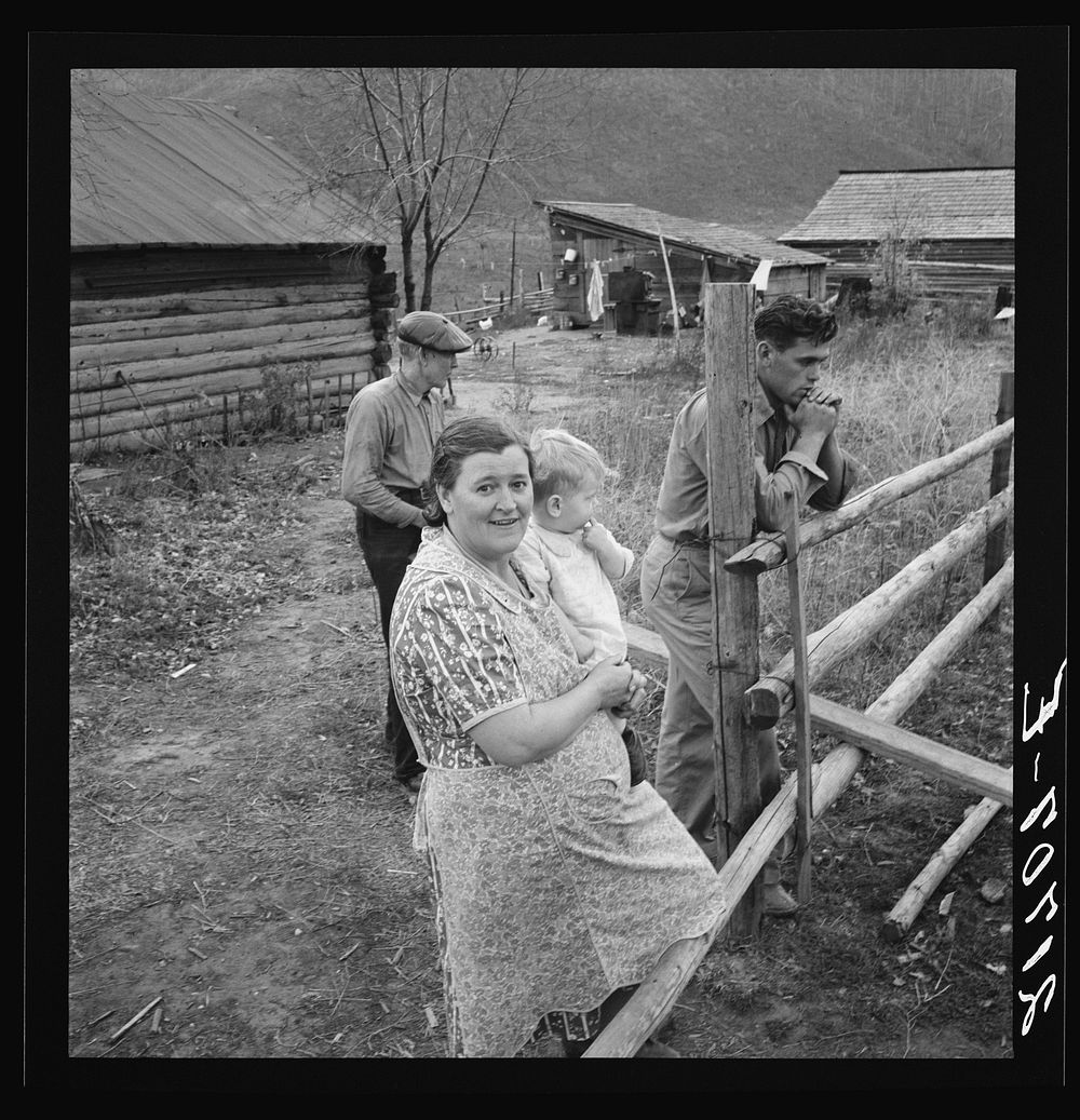 [Untitled photo, possibly related to: Farm family in the cut-over land. Priest River Valley, Bonner County, Idaho. The…