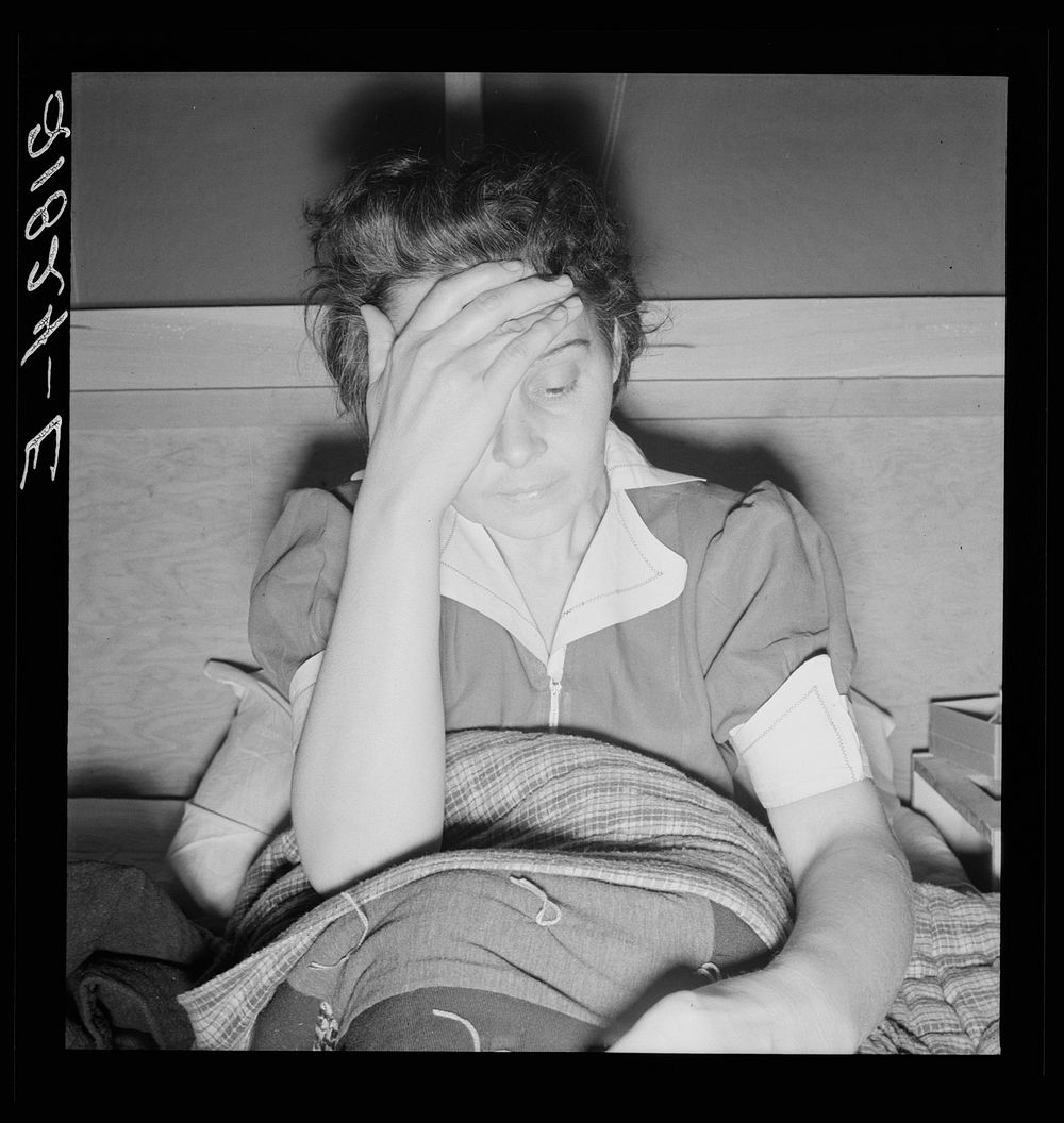 Sick woman awaits visit of the doctor. Merrill FSA (Farm Security Administration) camp, Klamath County, Oregon. Sourced from…