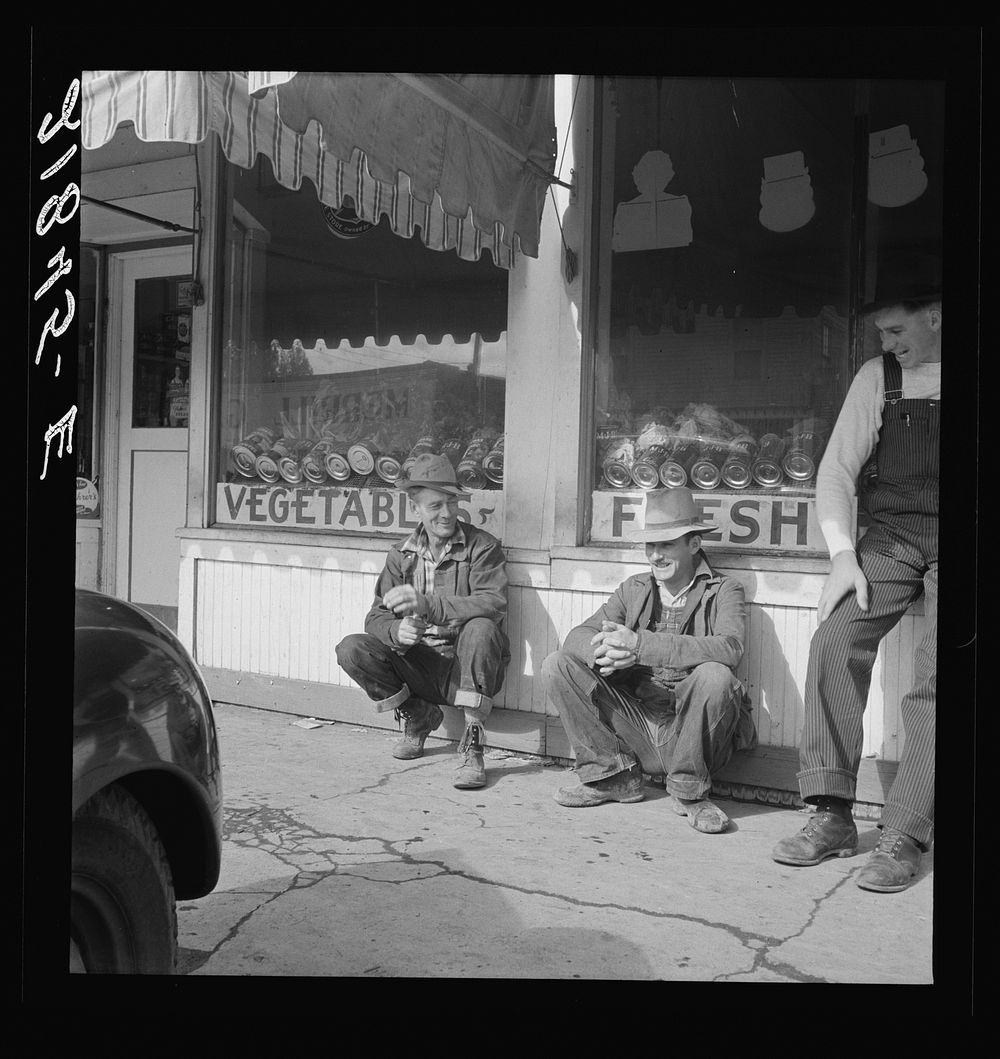 On main street of potato town during harvesting season. Merrill, Oregon. Sourced from the Library of Congress.