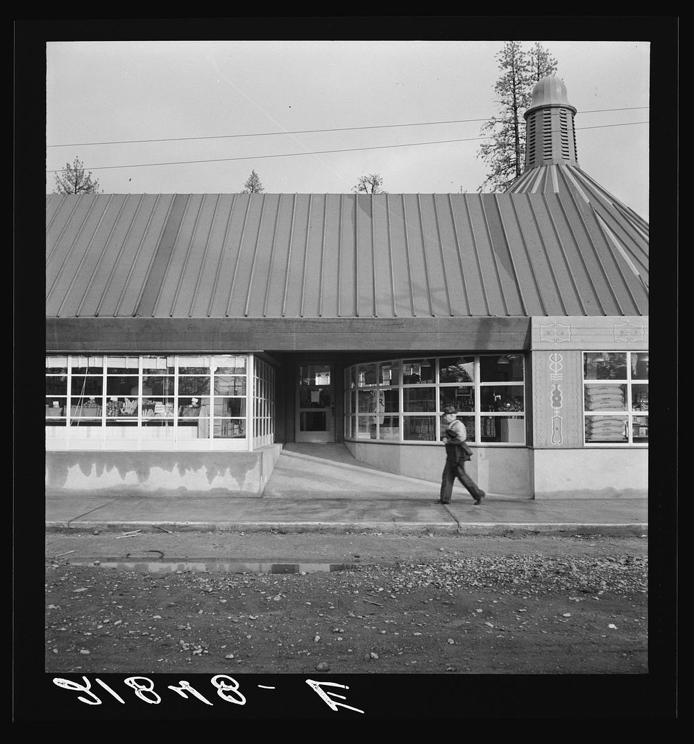 [Untitled photo, possibly related to: Stores and community center in model lumber company town, Gilchrist, Oregon. See…