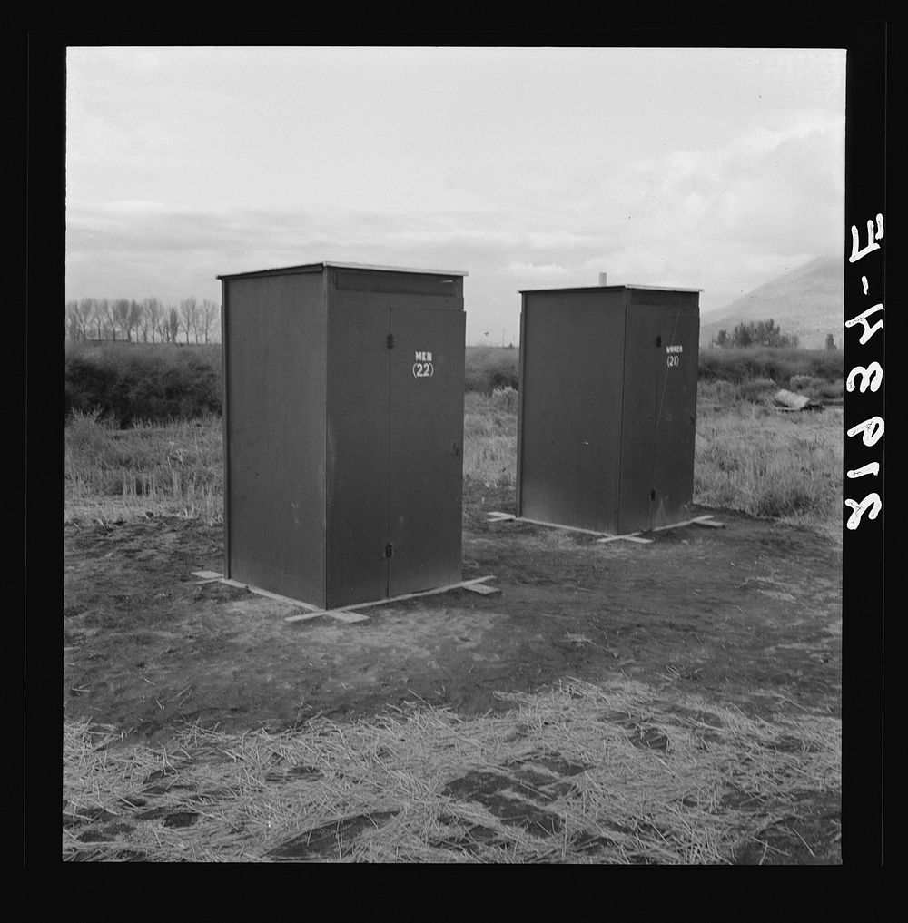 [Untitled photo, possibly related to: Twenty-four portable toilets, mobile camp (FSA - Farm Security Administration)…