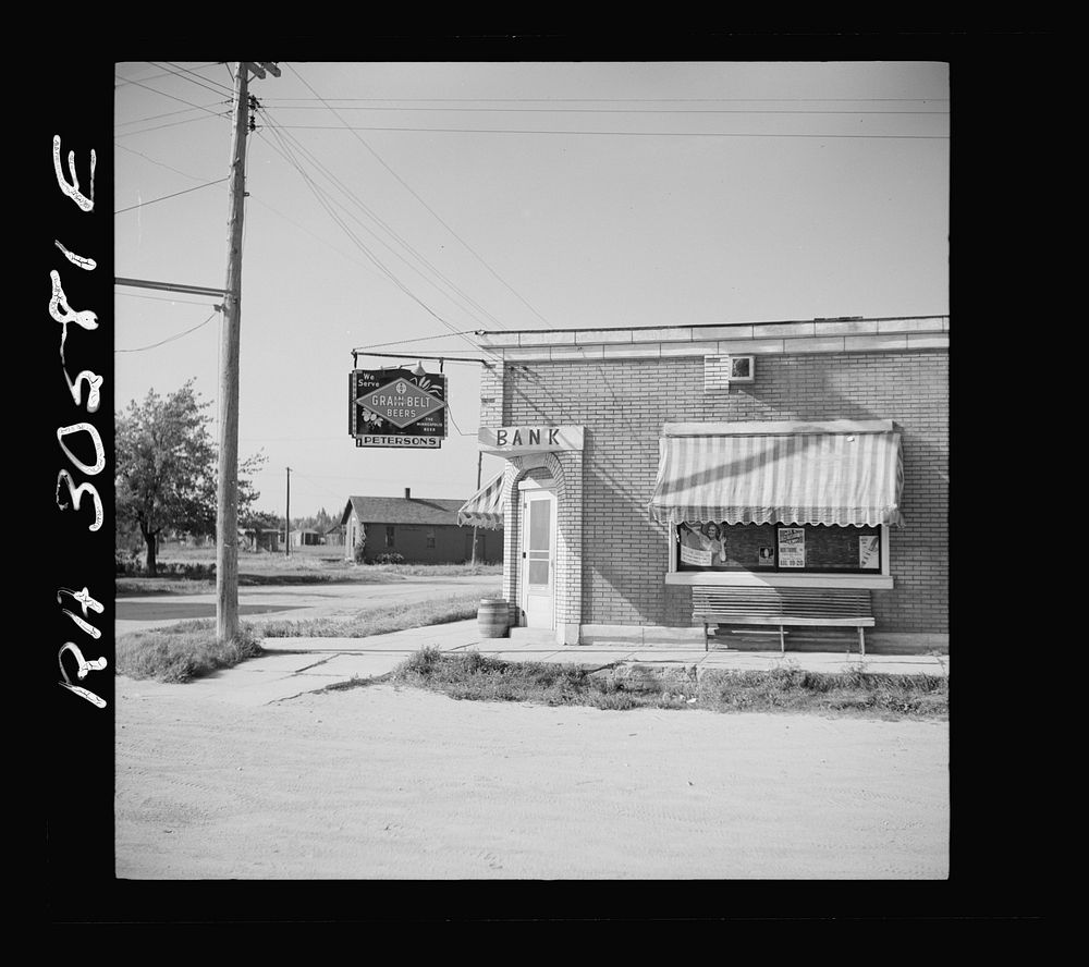 Former bank, now a saloon. Mizpah, Minnesota by Russell Lee